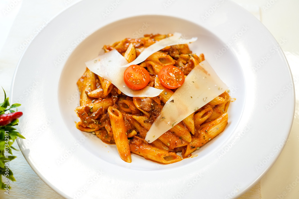 Pasta dish on a restaurant table Pasta dish on a restaurant table