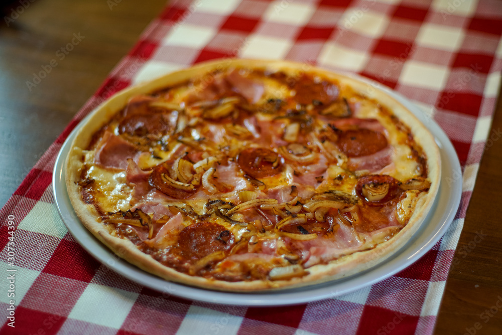 Pizza on a restaurant table Pizza on a restaurant table