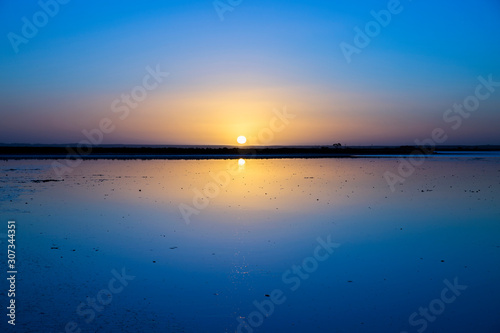 Early morning sunrise over Lake Tyrrell  a shallow salt lake in North West Victoria  Australia.