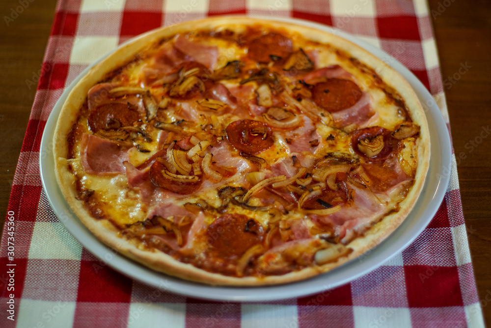 Pizza on a restaurant table Pizza on a restaurant table