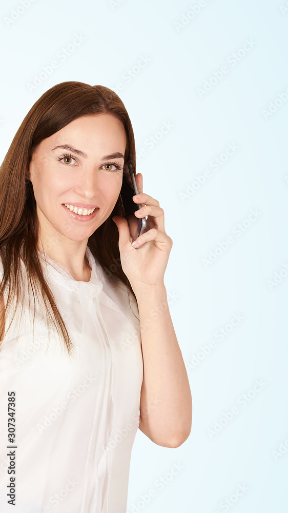 Young girl with mobilephone. Business woman talking on phone. Adorable caucasian businesswoman shopping Young girl with mobilephone. Business woman talking on phone. Adorable caucasian businesswoman shopping