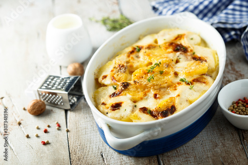 Homemade potato gratin with cream photo