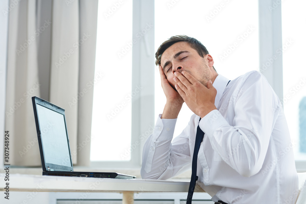 businessman working on laptop in office businessman working on laptop in office