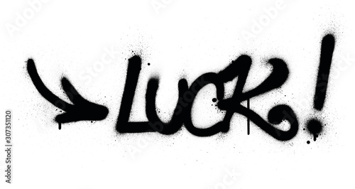 graffiti luck word sprayed in black over white