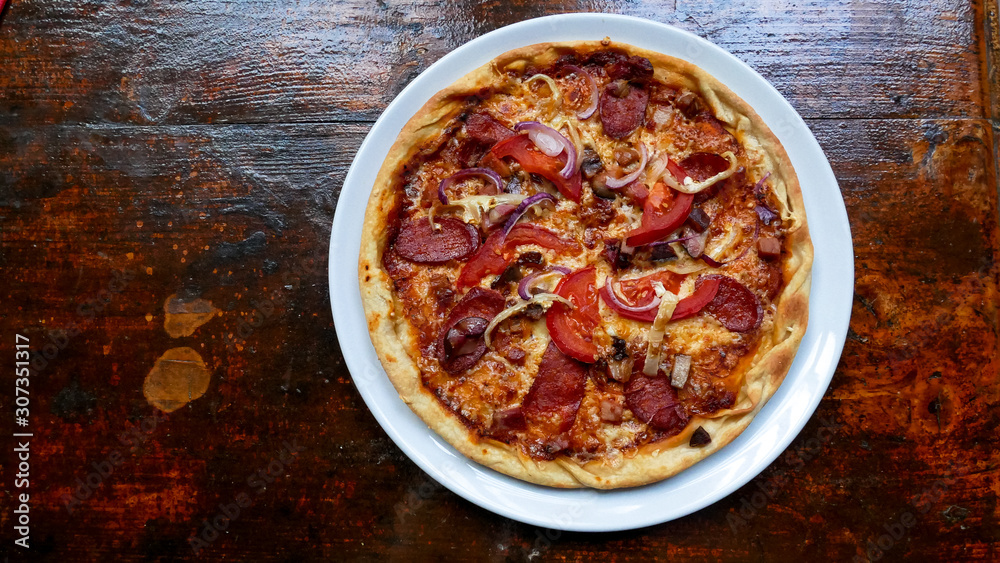 Pizza on a restaurant table Pizza on a restaurant table