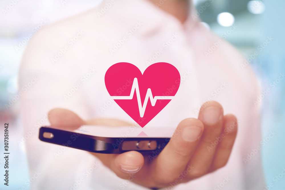 アプリで健康や心電図をチェック health care cardiogram application on smartphone アプリで健康や心電図をチェック health care cardiogram application on smartphone