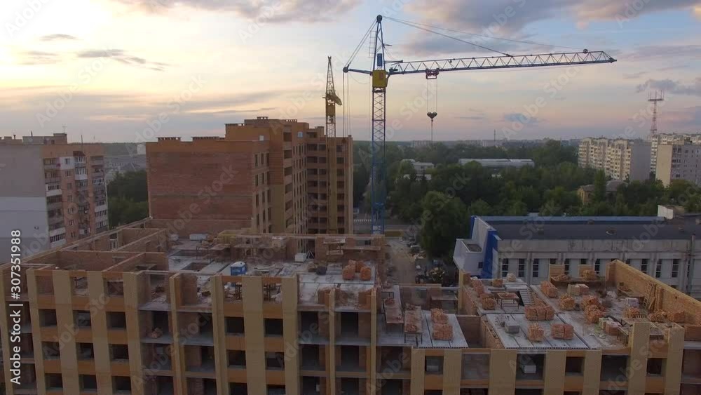 Aerial view construction site with crane at the building background Aerial view construction site with crane at the building background
