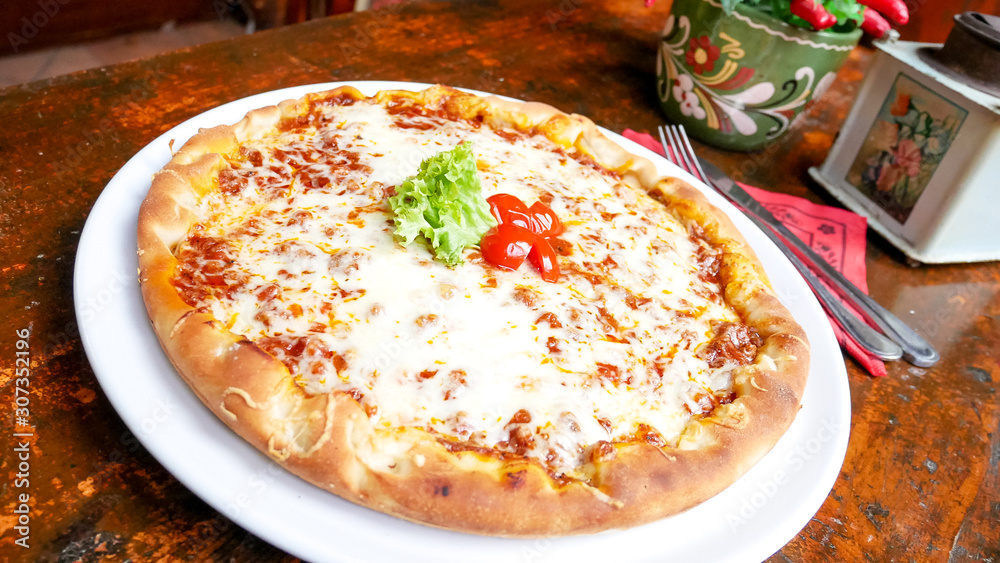 Pizza on a restaurant table Pizza on a restaurant table