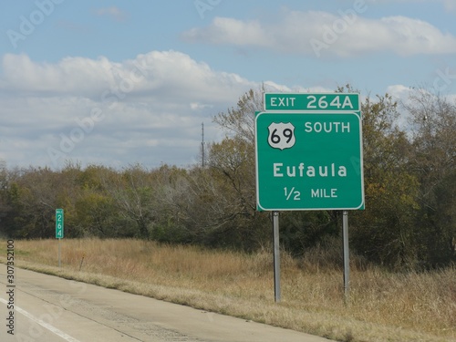 Roadside sign with distance to Eufala, Oklahoma.