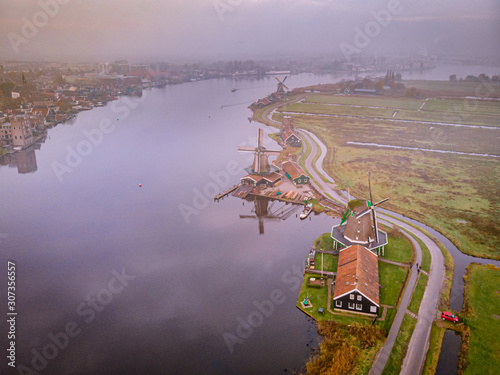 Windmills of the Zaanse Schans a windmill village near Amsterdam Netherlands photo