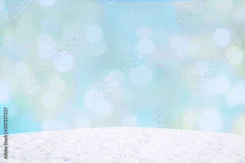 wintry background with flares and snowy hill, space for text © SusaZoom