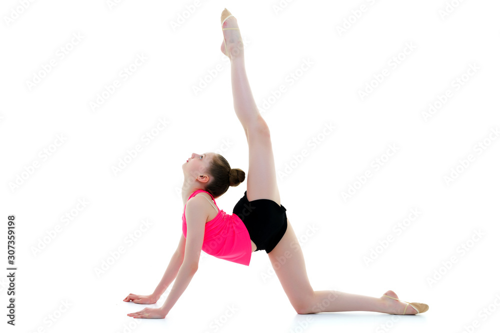 The gymnast perform an acrobatic element on the floor.