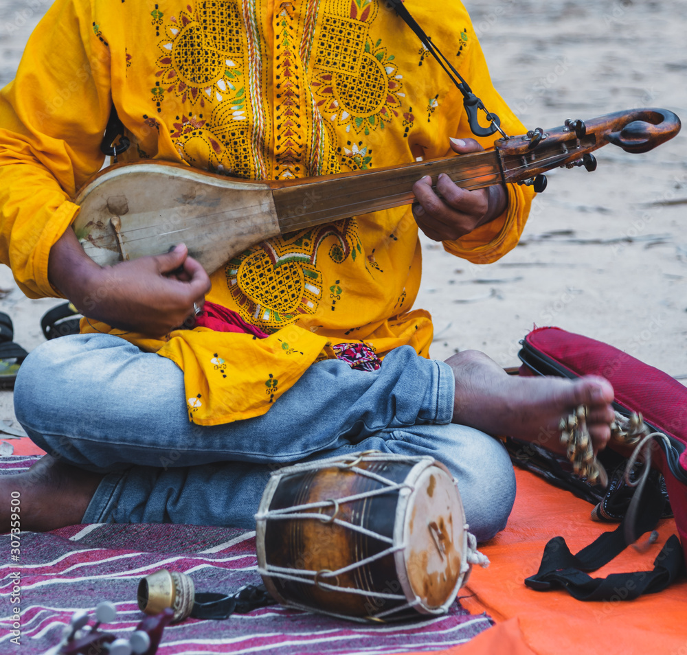 The Dotora Dotar which is an instrument much associated with the