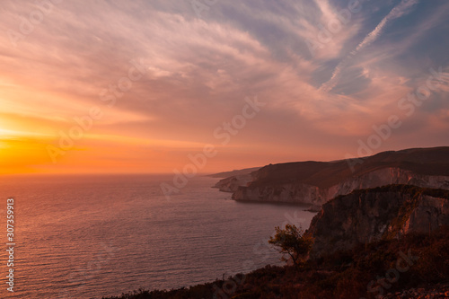 Coastal landscape with colorful dramatic sunset