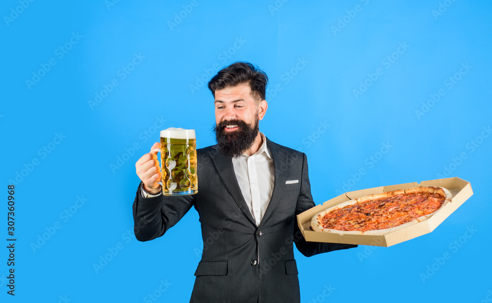 Restaurant or pizzeria. Pizza time. Smiling man with beard holds delicious pizza in box and cold beer. Pizza delivery concept. Fastfood. Italian food. Bearded man with tasty pizza and beer in hands. Restaurant or pizzeria. Pizza time. Smiling man with beard holds delicious pizza in box and cold beer. Pizza delivery concept. Fastfood. Italian food. Bearded man with tasty pizza and beer in hands.