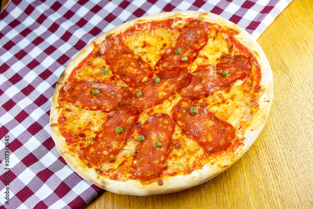 Pizza on a restaurant table Pizza on a restaurant table
