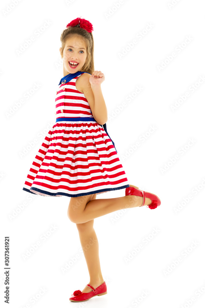 Little girl in an elegant dress.The concept of a happy childhood Little girl in an elegant dress.The concept of a happy childhood