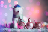 Pink Christmas decorations with lights and space for text. 
