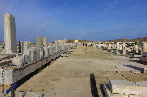 Iconic and amazing archaeological site in uninhabited island of Delos, Cyclades, Greece © aerial-drone