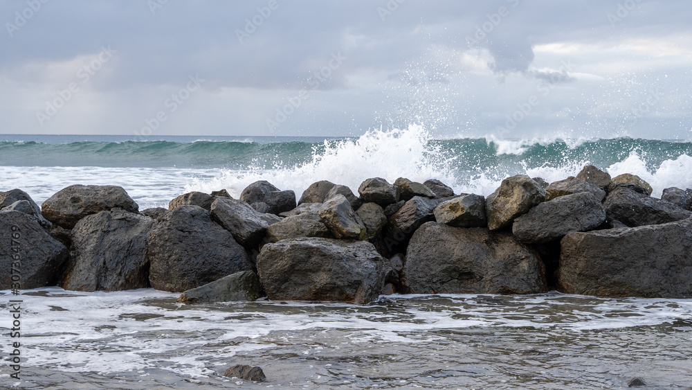 Ocean hitting rocks