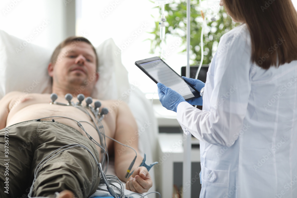 Fototapeta premium Female doctor with tablet