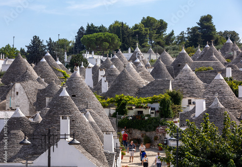 Tradtional white houses in Trulli village. Alberobello, Italy. 