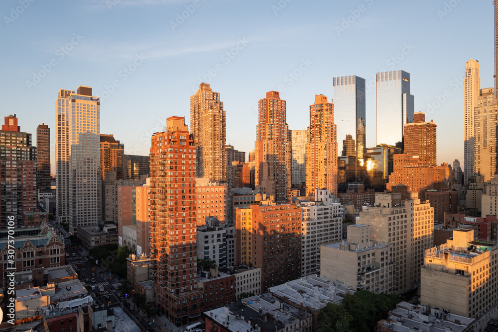 Fototapeta premium Hell's Kitchen panorama skyline and the 8th Avenue at sunset, Midtown Manhattan, New York City