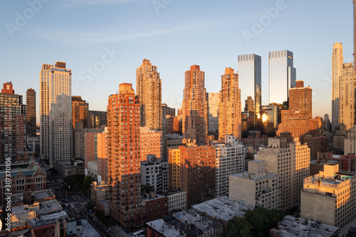 Hell's Kitchen panorama skyline and the 8th Avenue at sunset, Midtown Manhattan, New York City