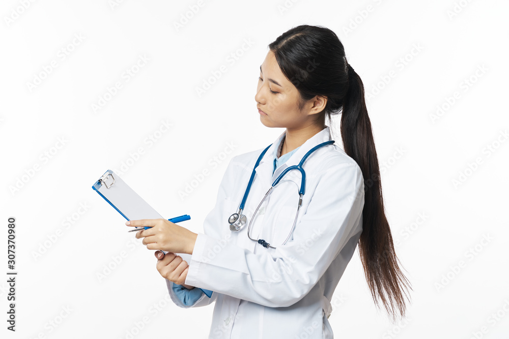 young doctor with clipboard young doctor with clipboard