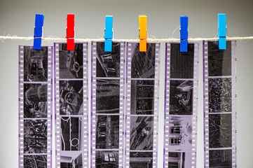 Negative Black and White Film is Dried in the Darkroom. Vintage Aged Analog  Exposure Retro Memory Dry Camera