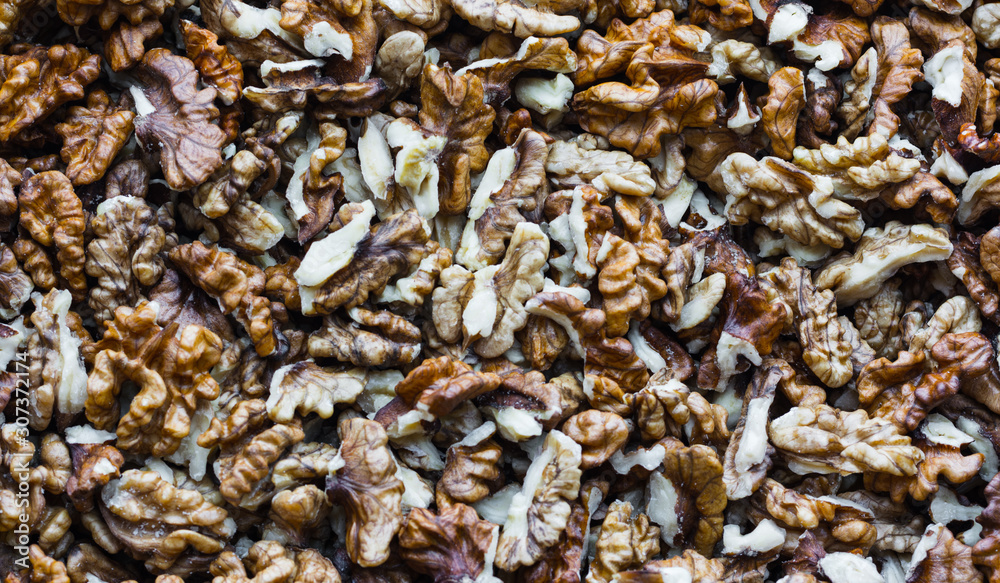 peeled walnuts laid out on the table peeled walnuts laid out on the table
