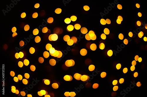 Abstract background with defocused lights. Bokeh effect.