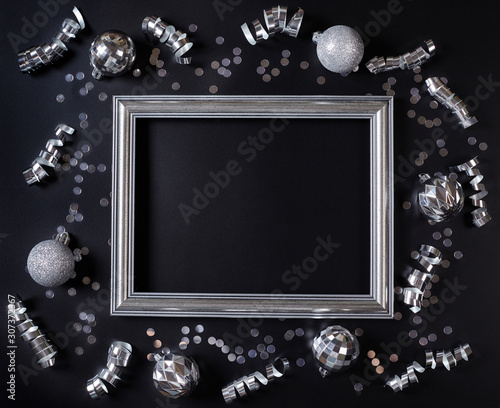 New year and christmas background with silver decorations and frame.