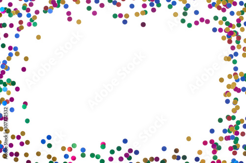 Colorful confetti forming frame.