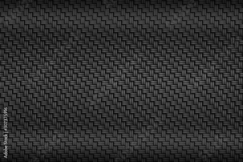 black carbon fiber plate. dark metal background and texture.