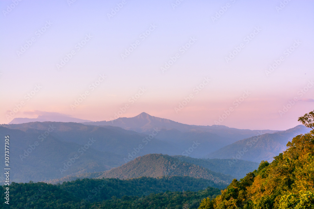Mountains during sunset. Beautiful natural landscape. Mountains during sunset. Beautiful natural landscape.