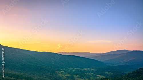 Mountains during sunset. Beautiful natural landscape. © Sitthipong