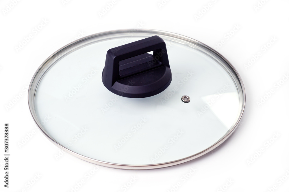 Glass lid with a plastic handle for a pot or pan, shot on a white background Glass lid with a plastic handle for a pot or pan, shot on a white background