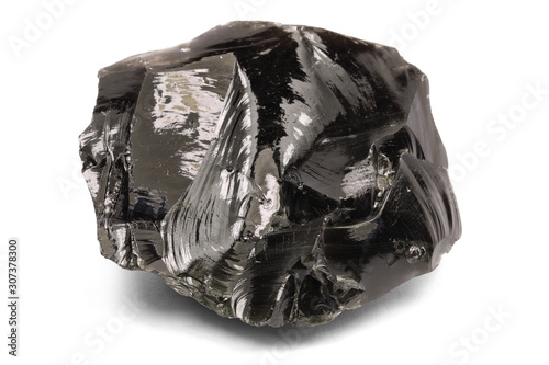 Black rock obsidian isolated on white background photo