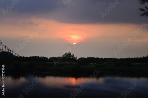 sunset over lake © pai