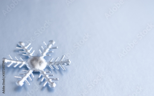 silver snowflakes on cold grey background christmas and winter composition flatlay © Akoza