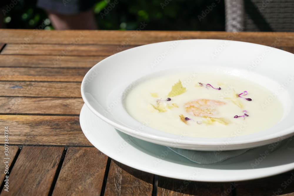 Soup on a restaurant table Soup on a restaurant table