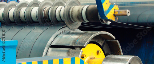 Machine for slitting/cutting/stripping steel sheets