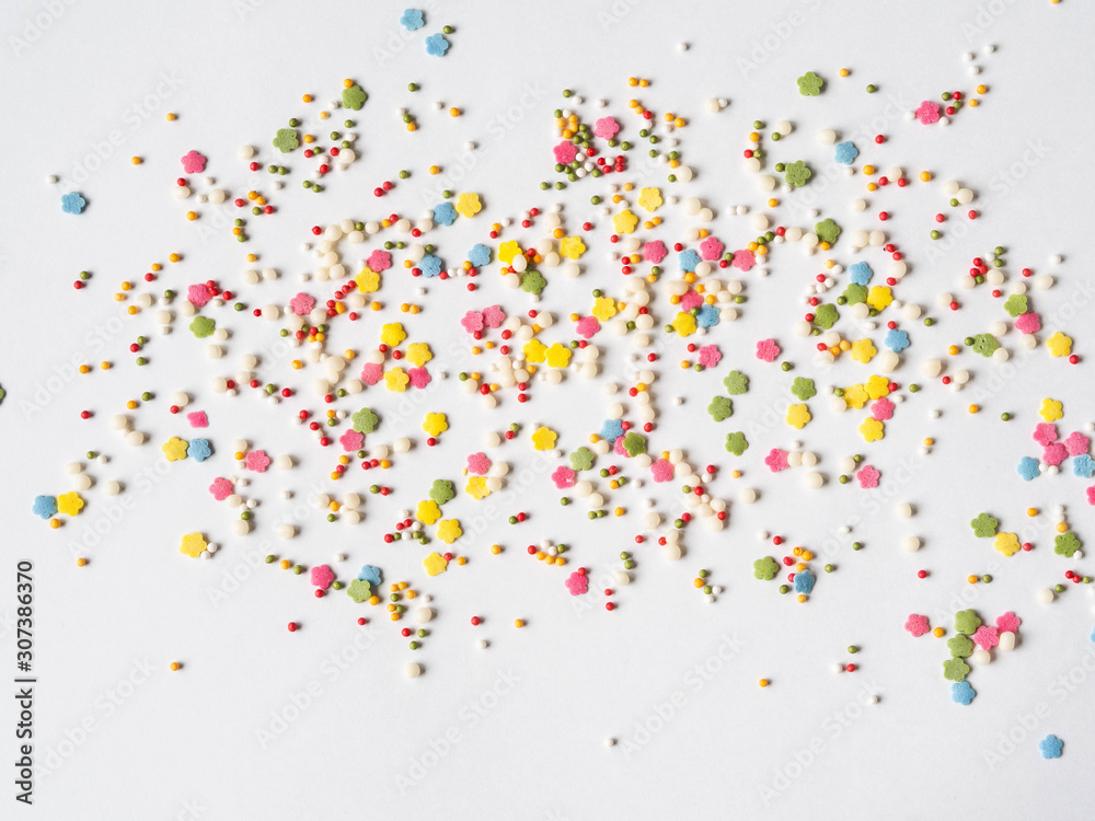 Colored sugar sprinkles background, Sugar sprinkle dots, decoration for cake and bakery, lot of sprinkles background
