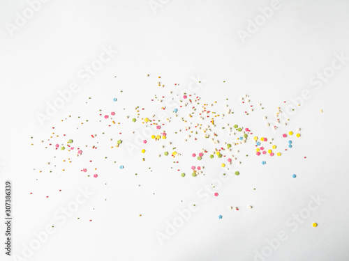 Billede på lærred Colored sugar sprinkles background, Sugar sprinkle dots, decoration for cake and