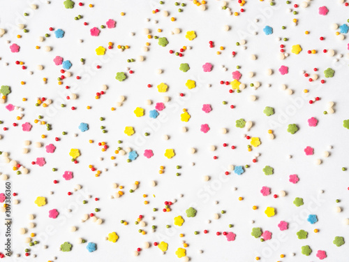 Colored sugar sprinkles background, Sugar sprinkle dots, decoration for cake and bakery, lot sprinkles background