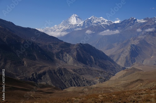 Amazing view of Mustang land in Nepal. White Dhaulagiri Mountain in background. Nepal, Himalaya