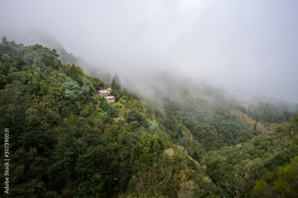 remote house on the steep mountain slope