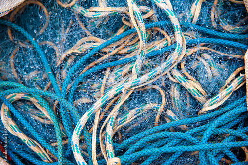 Blue ropes and fishing net in the big sack