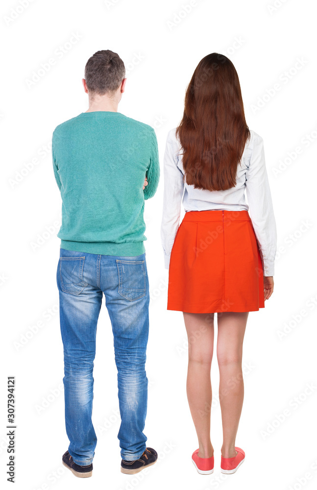 Back view of couple. beautiful friendly girl and guy together. Back view of couple. beautiful friendly girl and guy together.